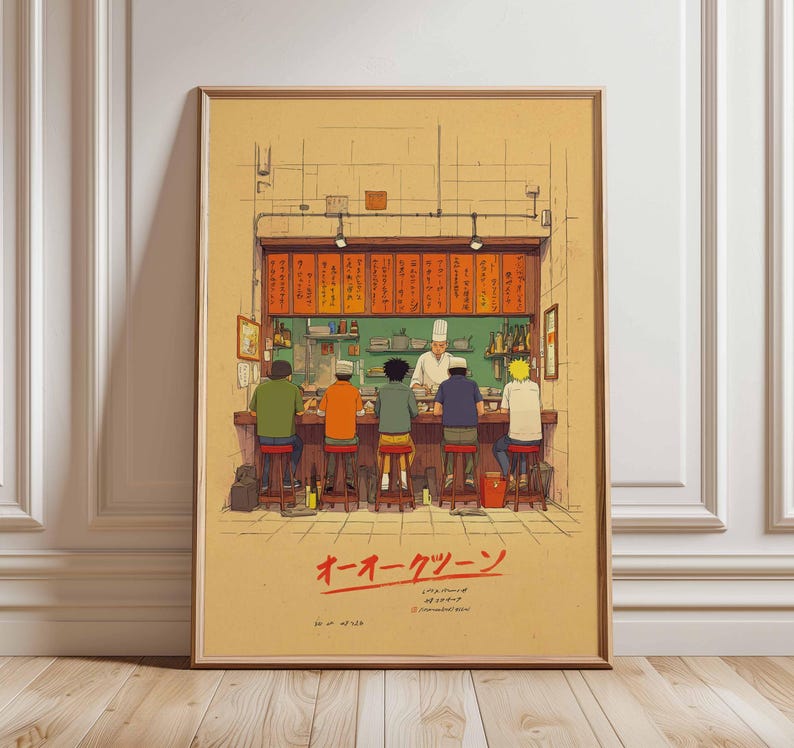 May include: Framed art print depicting a Japanese ramen shop scene. The illustration shows a chef behind a counter serving customers seated at a bar. The print has a vintage aesthetic with Japanese text at the bottom.