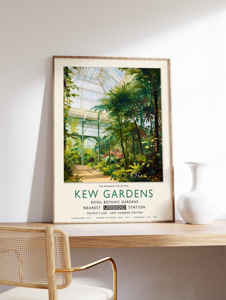 May include: A vintage poster advertising Kew Gardens, a botanical garden in London, England. The poster features a colorful illustration of the Palm House, a large glass structure with a domed roof. The text on the poster reads "Kew Gardens, Royal Botanic Gardens, Nearest Underground Station: District Line - Kew Gardens Station, Established 1759, Monday to Friday 10am - 7pm, Weekends 11am - 7pm."