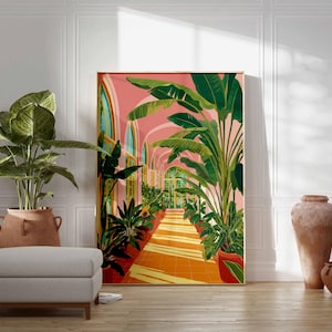 May include: A framed art print depicts a botanical scene with a pink arched hallway lined with lush green plants. The artwork is set against a white wall, with a potted plant, a gray ottoman, and terracotta vases in the foreground.