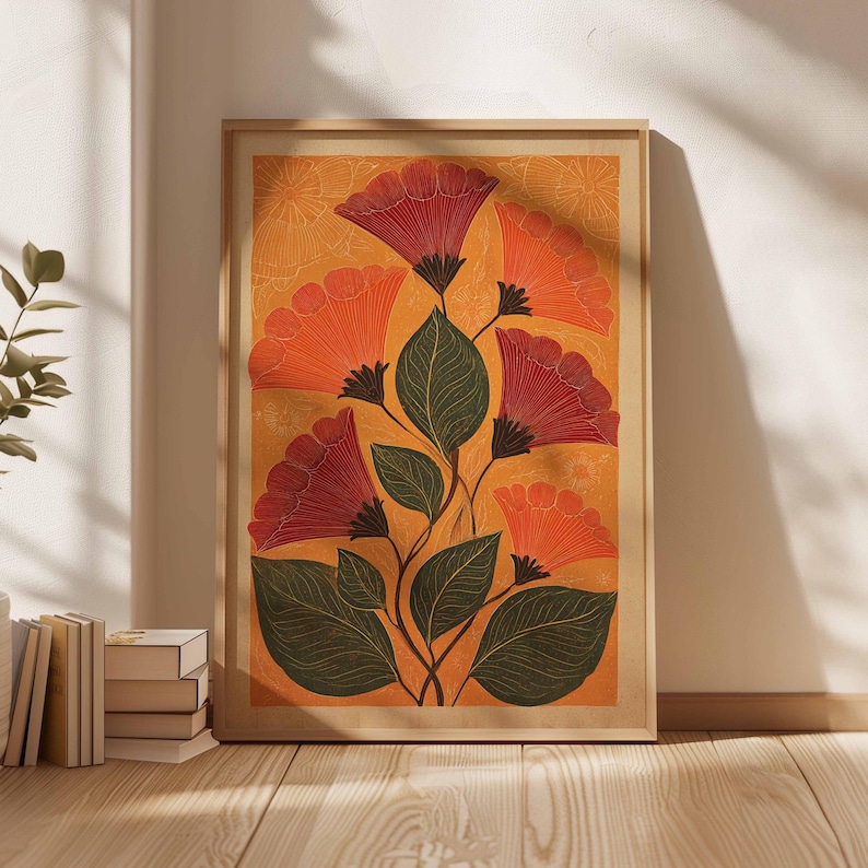 May include: A framed art print featuring stylized flowers in shades of red and orange against a golden background. The artwork includes detailed green leaves and a light brown wooden frame, suitable for home decor.