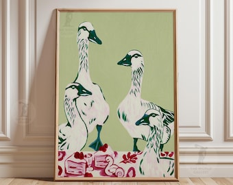 May include: A framed art print featuring a stylized illustration of four geese. The geese are primarily white with green and black accents, set against a light green background. The artwork includes a decorative border with red and pink elements.