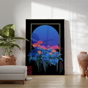 May include: A framed art print featuring a floral design with a blue moon backdrop. The artwork showcases vibrant orange and pink flowers against a black background, with gold trim. The print is displayed in a room with a plant, ottoman, and decorative vases.