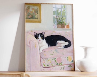 Póster vintage de gato, gato blanco y negro sobre un sofá floral.