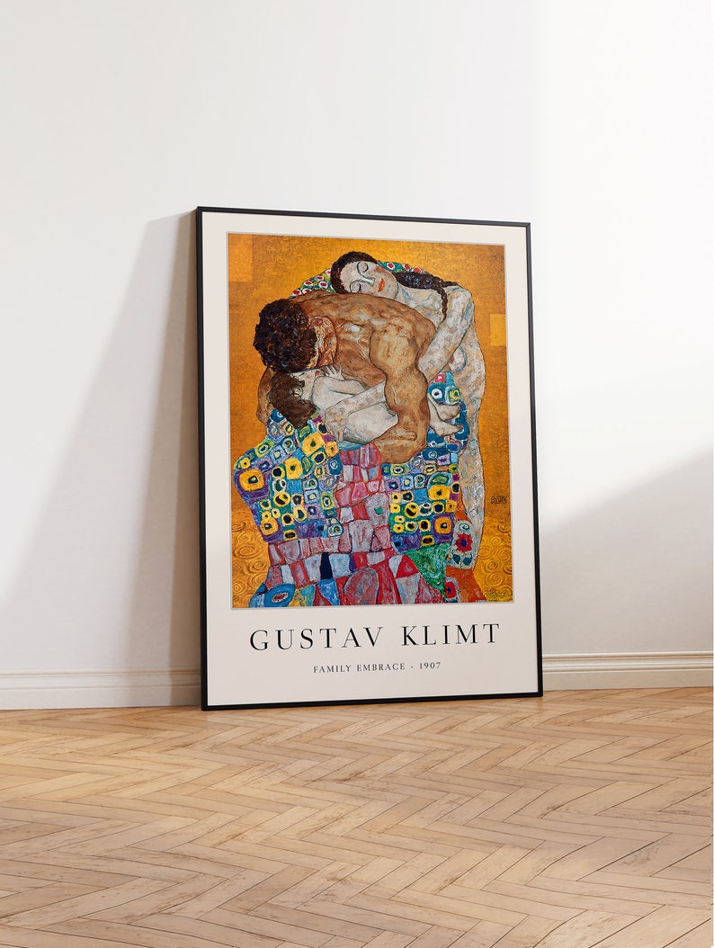 May include: A framed poster of Gustav Klimt's painting "Family Embrace" from 1907. The painting depicts a family in an embrace, with the woman's body covered in colorful geometric patterns.