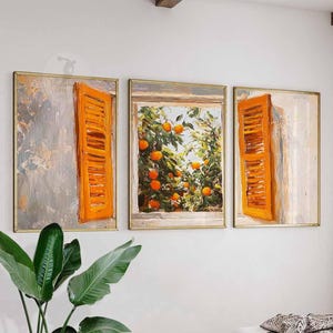 Puede incluir: Tríptico de impresiones artísticas enmarcadas. Cada impresión presenta una ventana con contraventanas naranjas. La impresión central muestra un naranjo. La obra de arte tiene un estilo texturizado e impresionista con una paleta cálida.