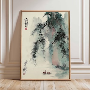 Puede incluir: Obra de arte enmarcada de inspiraci&oacute;n asi&aacute;tica que presenta un paisaje sereno. La pintura representa una escena de monta&ntilde;a con una rama de &aacute;rbol en primer plano, en tonos verdes, azules y rosas. Dos peque&ntilde;as figuras est&aacute;n en un bote en la parte inferior. La obra est&aacute; en un marco de madera.