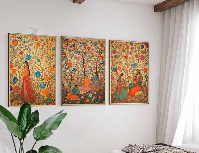 May include: Three framed prints with colorful floral patterns and figures in traditional Indian clothing. The prints are set against a white wall.