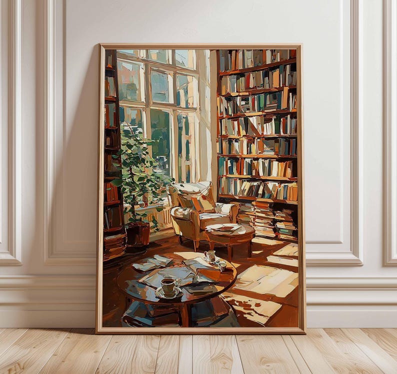 May include: A framed painting depicts a cozy library scene. Sunlight streams through a large window, illuminating a comfortable armchair, a round coffee table with books and a cup of coffee, and floor-to-ceiling bookshelves filled with books. The color palette is warm, with browns, tans, and yellows.
