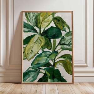 May include: A framed botanical print displaying a lush arrangement of green leaves. The painting uses a palette of greens, from dark to light, against a neutral backdrop. The artwork is encased in a wooden frame, adding a natural element to the piece.