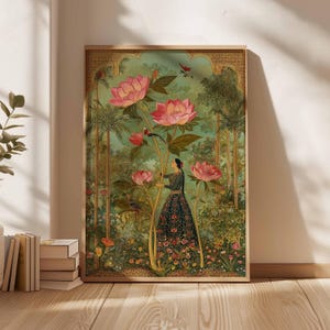 May include: A framed art print featuring a woman in a floral dress amidst a lush garden with large pink flowers. The artwork has a vintage aesthetic with a detailed, colorful illustration and a gold-toned frame.