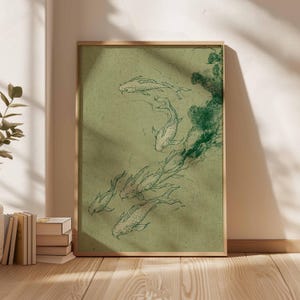 May include: A framed art print featuring a school of koi fish swimming in a flowing pattern. The artwork is rendered in a minimalist style with green ink on a textured, olive-green background. The frame is a natural wood color.