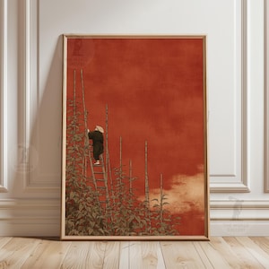 Könnte beinhalten: Gerahmter Kunstdruck mit einer Person, die eine Leiter zwischen hohen Pflanzen vor einem roten Himmel erklimmt. Die Person trägt dunkle Kleidung und einen weißen Hut. Das Kunstwerk hat eine Vintage-Ästhetik.