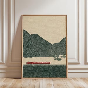 Peut inclure: Impression d'art encadrée représentant un train rouge traversant un paysage vert foncé, avec des montagnes vert foncé en arrière-plan. Le ciel est de couleur beige clair. L'œuvre a un aspect texturé et pointillé.