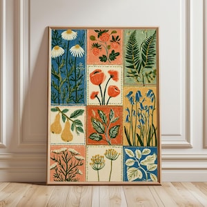 May include: A rectangular wall art print featuring a grid of twelve botanical illustrations. The panels display various plants, flowers, fruits, and leaves in shades of blue, orange, yellow, green, and cream, all enclosed within a thin wooden frame.