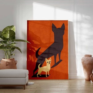 May include: A framed art print featuring a stylized illustration of a Chihuahua dog with a dark silhouette of a larger dog on an orange background. The artwork is displayed in a room with a plant, ottoman, and decorative vases.