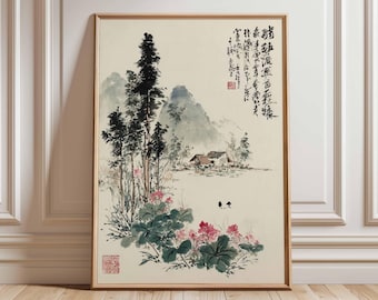 May include: Framed Asian-style landscape art print. The artwork features a serene scene with mountains, trees, and a small house. The foreground includes pink flowers and green foliage. Calligraphy is present on the right side of the print.