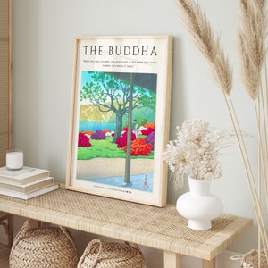 May include: A framed print with a quote by the Buddha, "When you like a flower, you just place it. But when you love a flower, you water it daily." The print features a Japanese garden scene with a red bridge and a pond.