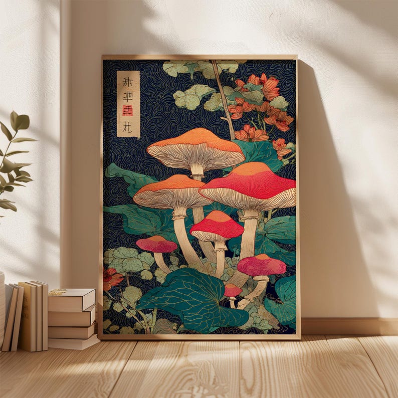 May include: Framed art print with a stylized illustration of mushrooms in red, orange, and pink against a dark blue background. Green foliage and orange flowers surround the mushrooms. The print has Japanese text in a vertical rectangle.