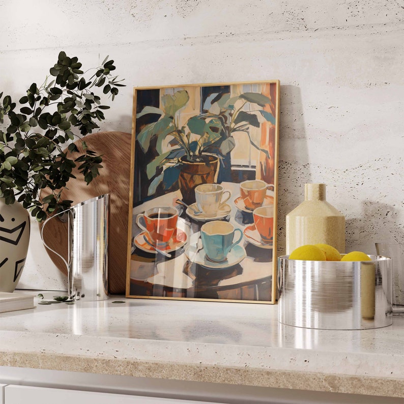 May include: A framed painting of a still life with a potted plant, five teacups, and saucers on a table. The teacups are in various colors, including red, blue, and white. The painting is set against a white wall.