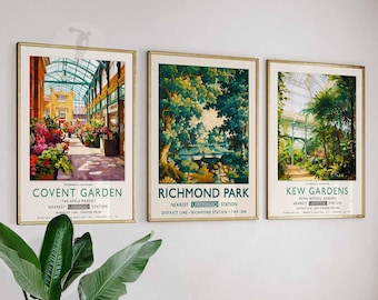 May include: Three vintage travel posters with gold frames. The posters feature illustrations of Covent Garden, Richmond Park, and Kew Gardens. Each poster includes the name of the location, the nearest station, and the transportation line.