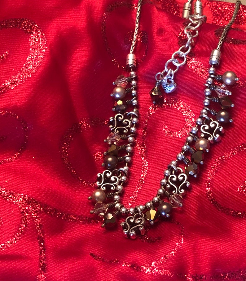 Brighton charm necklace 18 12 in adjustable chain.