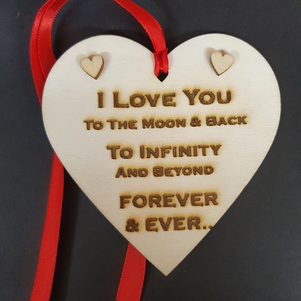 I Love you to the moon and back engraved wooden heart with ribbon hanging