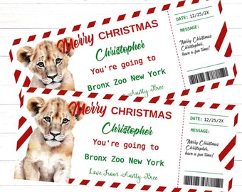 May include: Two Christmas-themed gift tickets featuring lion cub illustrations. The tickets have red and white striped borders and include text that reads "Merry Christmas Christopher, You're going to Bronx Zoo New York".