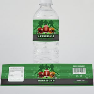 May include: Green and black water bottle labels with a football theme. The label features a football helmet, footballs, and the text "Harrison's 8th Birthday".