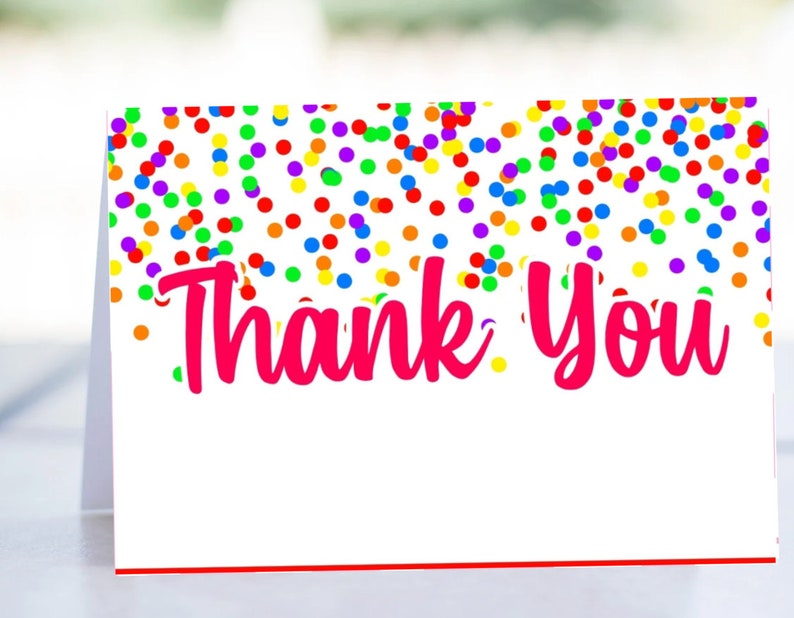 May include: A white thank you card with a red border. The card is decorated with a colorful confetti pattern. The text "Thank You" is written in pink.