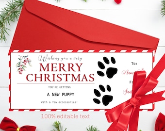 May include: A red Christmas card with the message "Wishing you a very Merry Christmas" and the text "You're getting a new puppy". The card has paw prints and is decorated with a red bow and greenery.