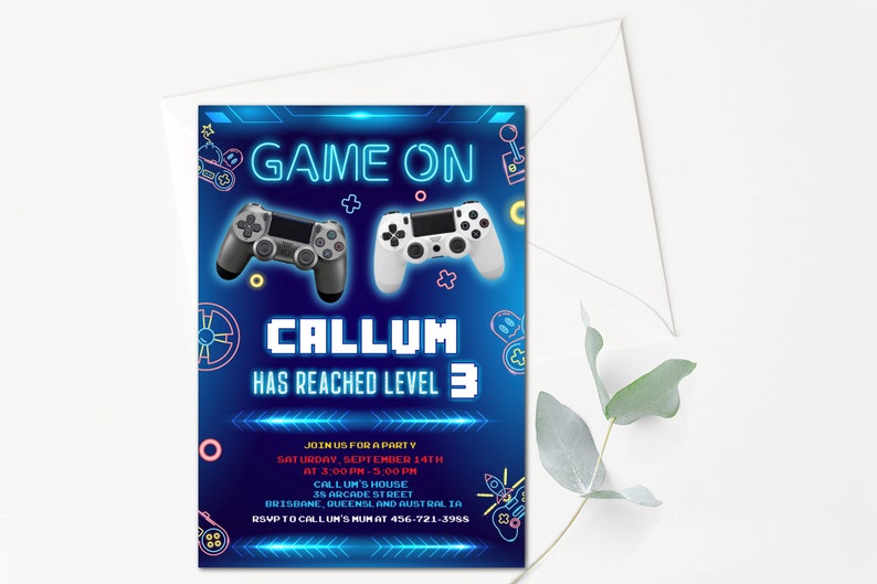 May include: A blue and neon-colored invitation for a video game themed party. The invitation says "Game On" and "Callum has reached level 3". It also includes a date, time, and location for the party.
