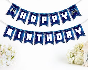 May include: A blue and white banner that reads "HAPPY BIRTHDAY" with a video game theme. Each pennant has a white letter, a game controller graphic, and the words "GAME ON". The banner is strung on a white cord.