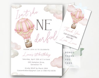 May include: A pink and white hot air balloon with a teddy bear passenger, a pink cloud, and the text "Isn't she one derful" on a white background. The text "Please join us to celebrate Lana's 1st birthday" is below the balloon. The text "Saturday, April 12th at 3 o'clock, 345 Hampton Drive, Galveston TX" is below the text "Lana's 1st birthday". The text "Kindly RSVP by March 29th CassandraDavid@gmail.com or 098-412-6578" is at the bottom of the invitation. A smaller card with a pink and white hot air balloon and the text "Thank You for celebrating with me Love Lana" is in the upper right corner of the image. The text "BONUS THANK YOU TAGS" is in the lower right corner of the image.