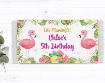 May include: A pink and white printable party banner with two pink flamingos and tropical leaves. The banner says "Let's Flamingle! Chloe's 5th Birthday".