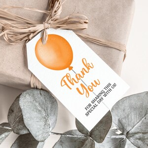 May include: Orange balloon thank you gift tag with the text "Thank You for sharing this special day with us!"