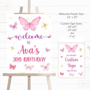 May include: A printable welcome sign for a 3rd birthday party with a butterfly theme. The sign is white with pink and purple butterflies and gold glitter. The text on the sign reads "Welcome to Ava's 3rd Birthday".