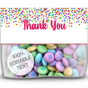 May include: A clear plastic bag filled with pastel-colored M&M's candies. A white circle with the text "100% EDITABLE TEXT" is in the lower left corner. A white label with a rainbow confetti border and the text "Thank You" is attached to the bag.