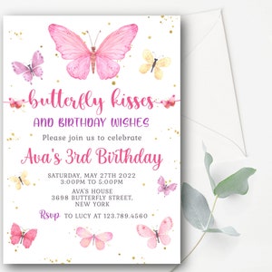 May include: A pink and white birthday invitation with a butterfly theme. The invitation says "butterfly kisses and birthday wishes" and "Ava's 3rd Birthday". The invitation includes the date, time, and location of the party.
