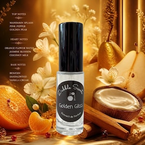 May include: A clear glass perfume bottle with a black cap and a circular black label featuring the text Dabble Scents Golden Gliss Extrait de Parfum. The label includes a small graphic of a perfume bottle and decorative white text.
