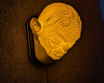 Lord of the Rings Golum inspired wall trophy lamp to decorate your room: bedroom, playroom or office.