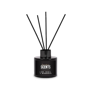 May include: Black reed diffuser with black reeds. The label reads "Signature SCENTS" with "LIME, BASIL & MANDARIN" below. A home fragrance product.