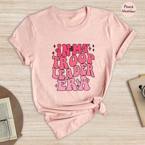 a t - shirt that says, under the roof leader ever