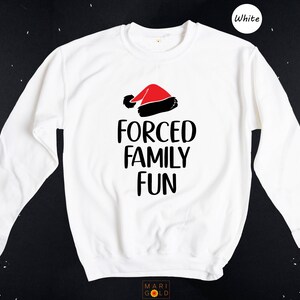 Sarcastic Christmas Family Tee: 'Forced Family Fun' Santa Hat Shirt image 8