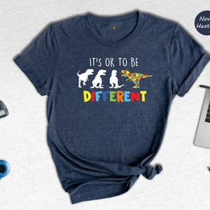 Autism Awareness Dinosaur T-Shirt: It's Ok To Be Different