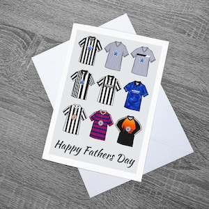 May include: A white card with a Happy Father's Day message and a collage of nine different football jerseys. The jerseys are in various colors, including black, white, blue, and red. Some of the jerseys have a star design.