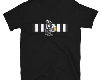 Camiseta unisex de manga corta con diseño de dibujos animados de Urraca con rayas blancas y negras.