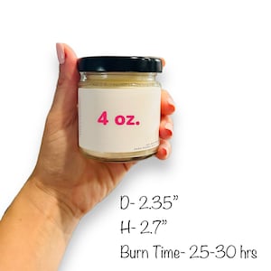 May include: A 4 ounce candle in a clear glass jar with a black lid. The candle is labeled "4 oz." and has a burn time of 25-30 hours. The jar is 2.35 inches in diameter and 2.7 inches tall.