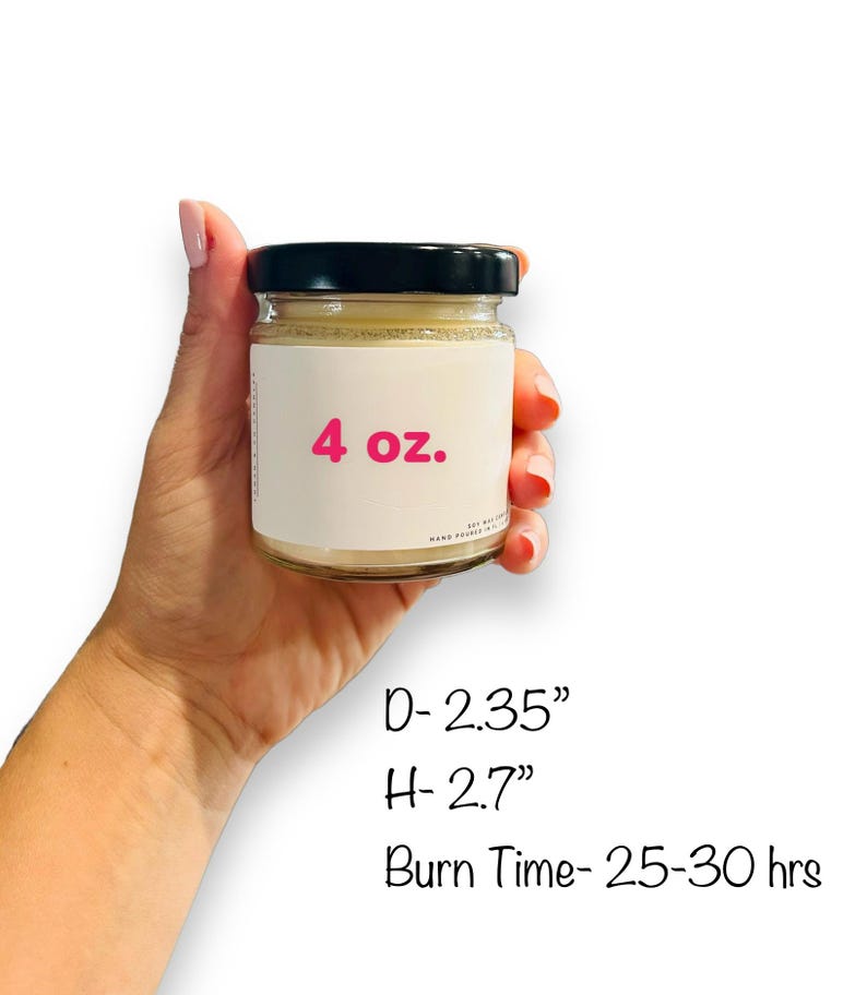 May include: A 4 ounce candle in a clear glass jar with a black lid. The candle is labeled with "4 oz." in pink text. The jar is 2.35 inches in diameter and 2.7 inches tall. The candle has a burn time of 25-30 hours.