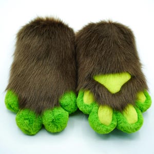 Soft, Brown fursuit handpaws with smooth green paw pads, designed for comfort and breathability for furries with sensitive skin during long convention days.