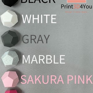 May include: A collection of geometric, multi-faceted shapes in various colors: black, white, gray, marble, sakura pink, and hot pink. The text in the image reads "BLACK", "WHITE", "GRAY", "MARBLE", "SAKURA PINK", and "HOT PINK". The logo "Print3D4You" is also visible.